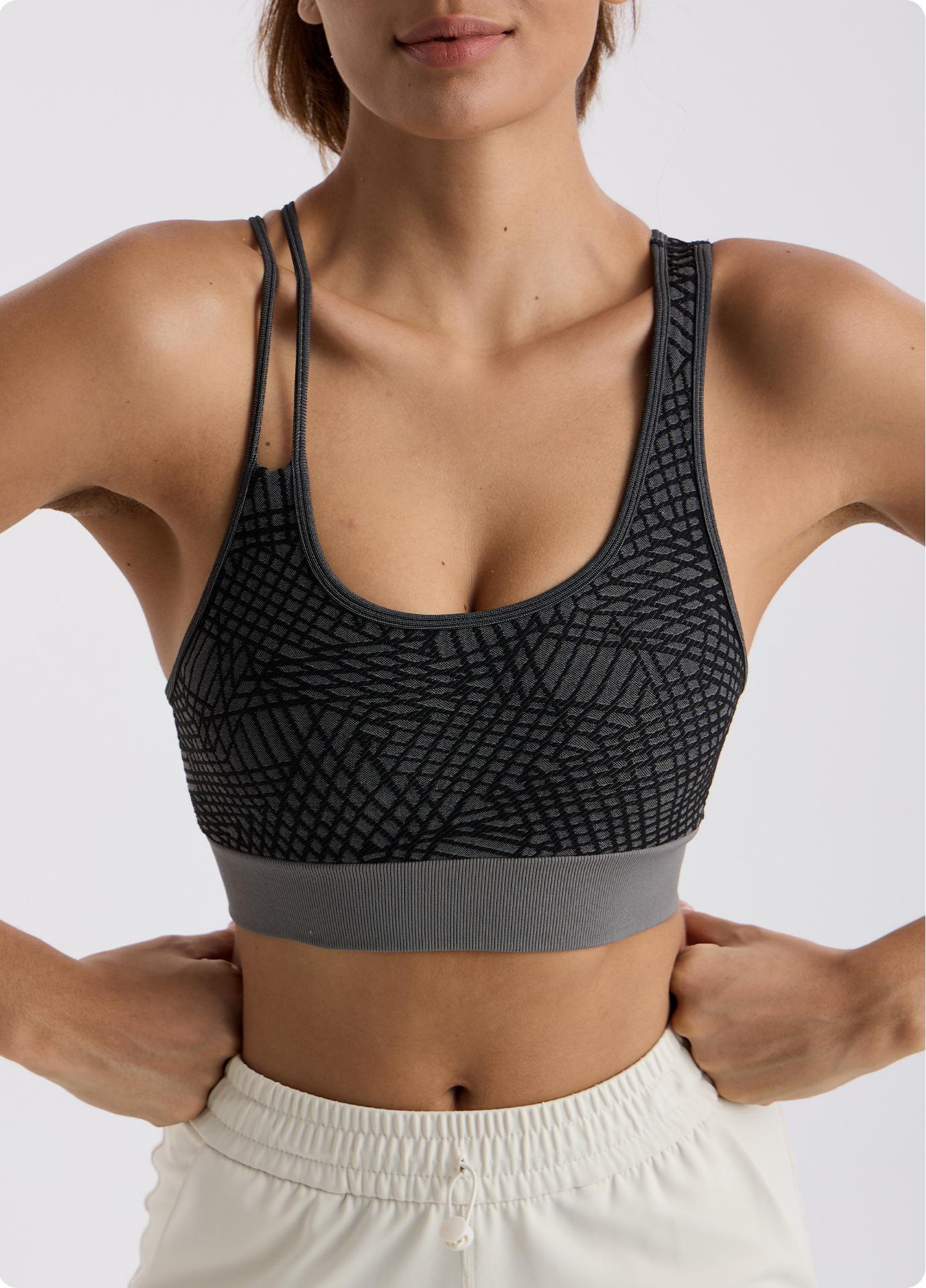Asymmetrical shoulder strap sports bra