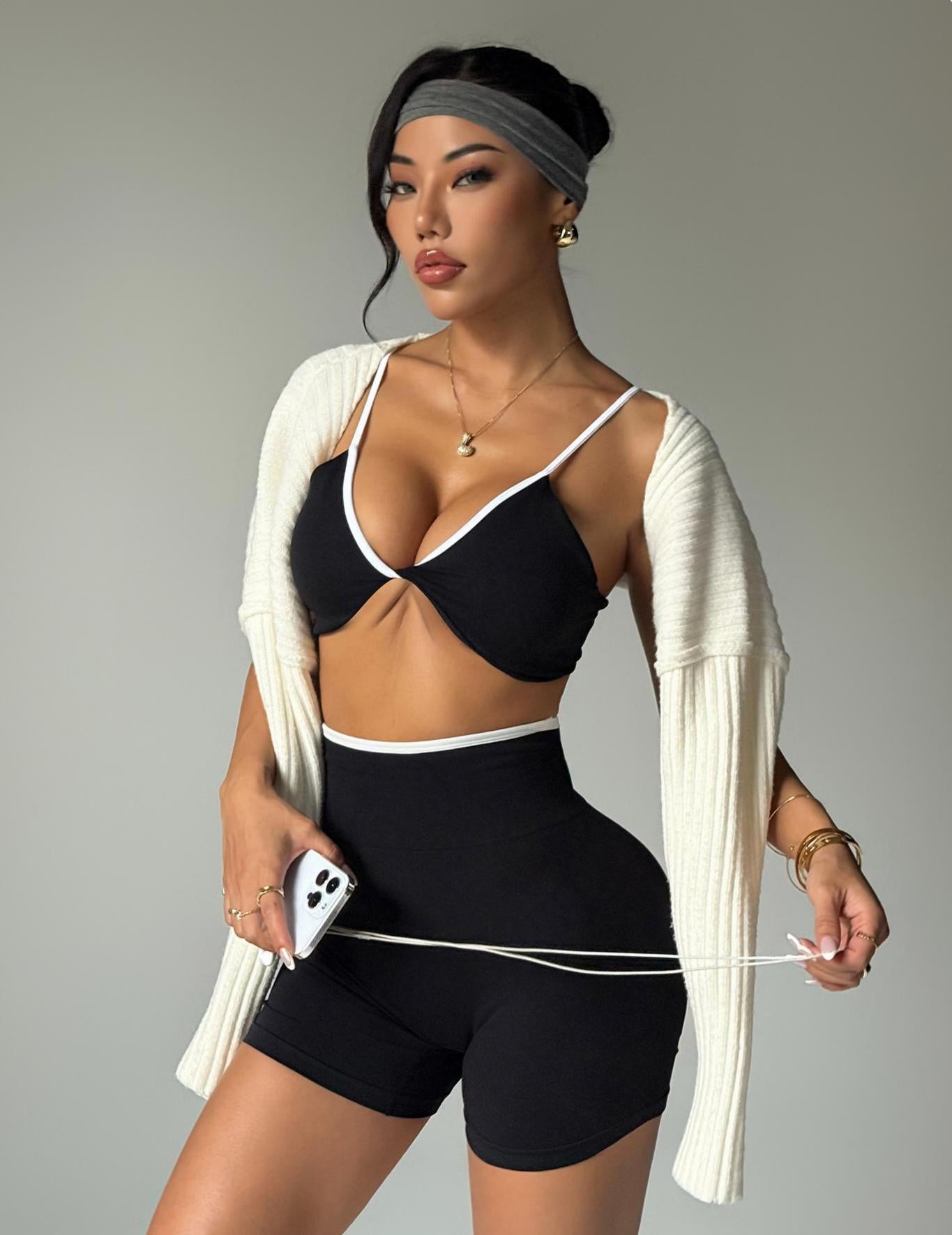 Lila Zen Color-blocked knotted backless bra and high-waisted yoga shorts two-piece set