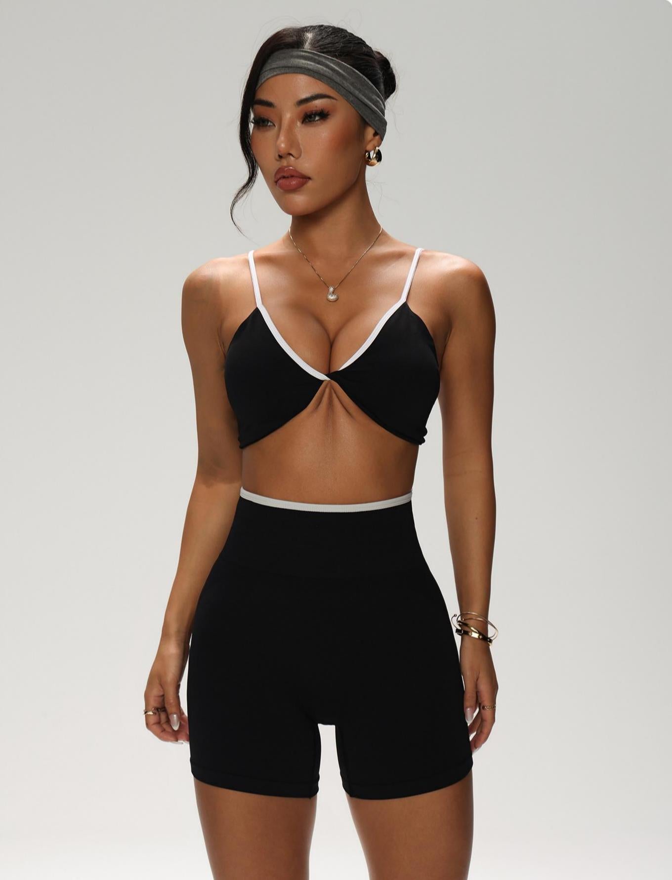 Lila Zen Color-blocked knotted backless bra and high-waisted yoga shorts two-piece set