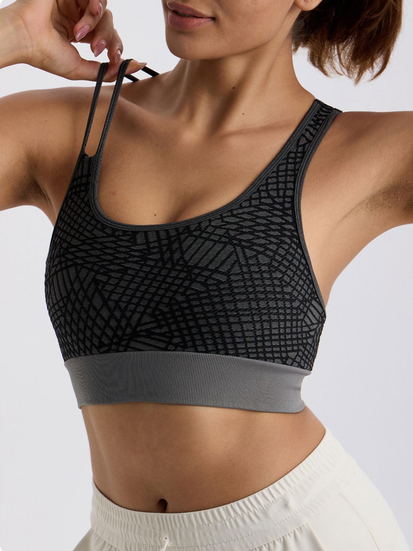 Asymmetrical shoulder strap sports bra