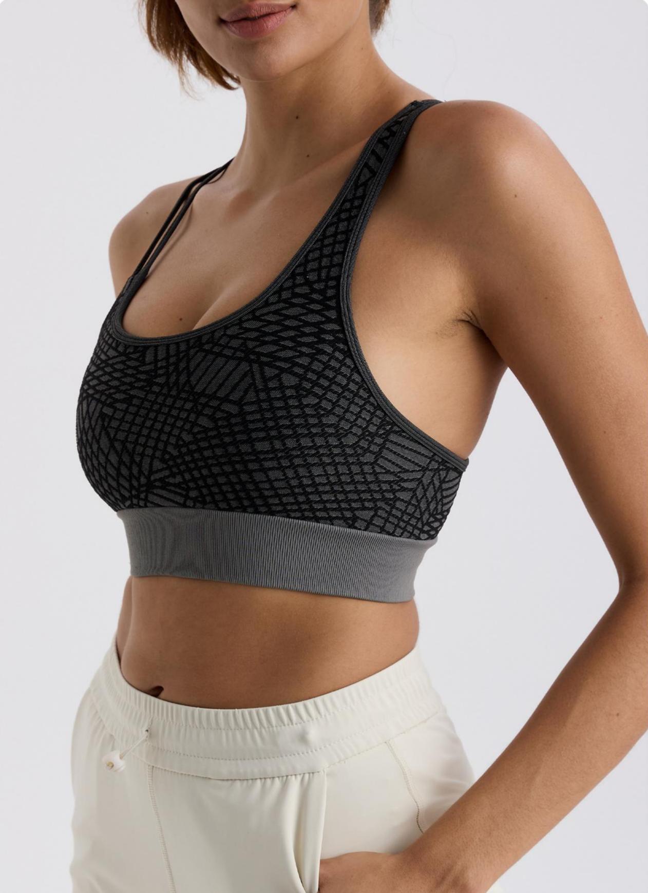 Asymmetrical shoulder strap sports bra
