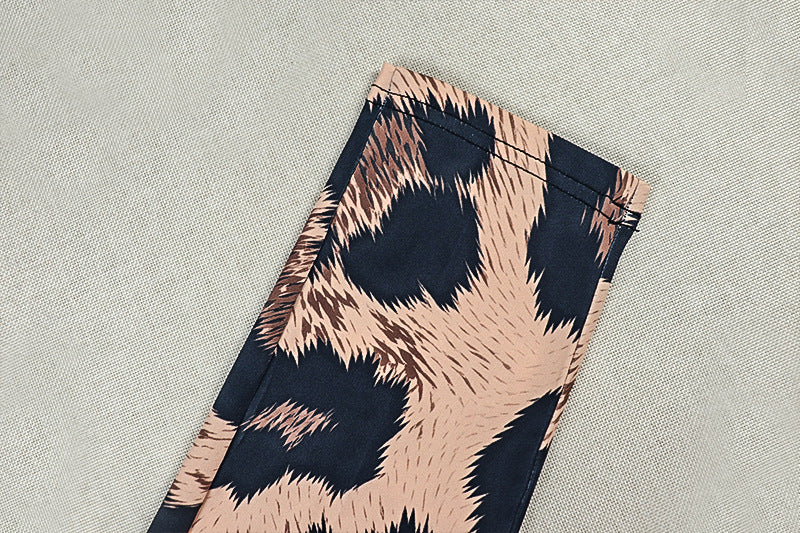 Leopard Print Cut-Out Halter Jumpsuit with Bow Detail