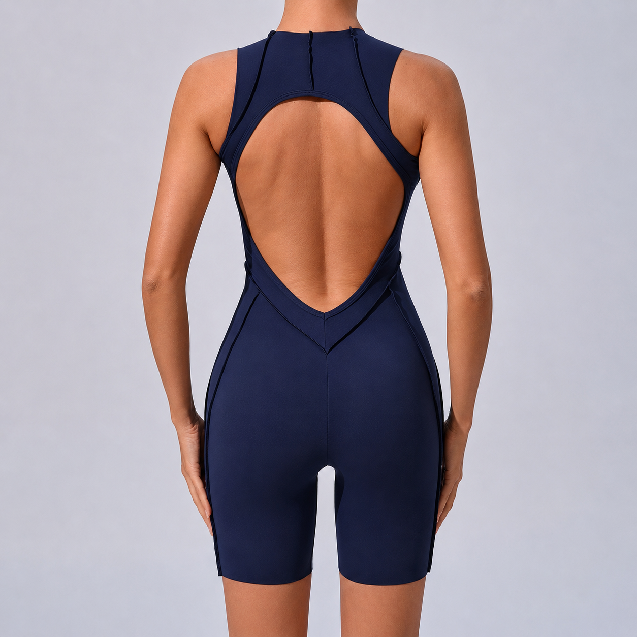 Lila Zen Sculpt Seam Open Back Biker Short Romper