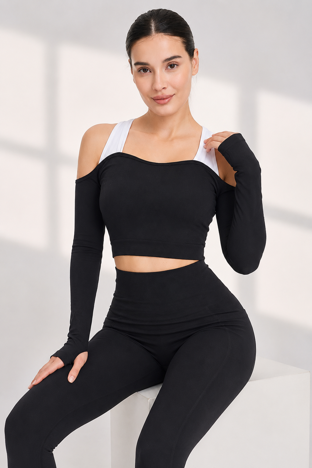 Lila Zen Color-blocked off-shoulder yoga top