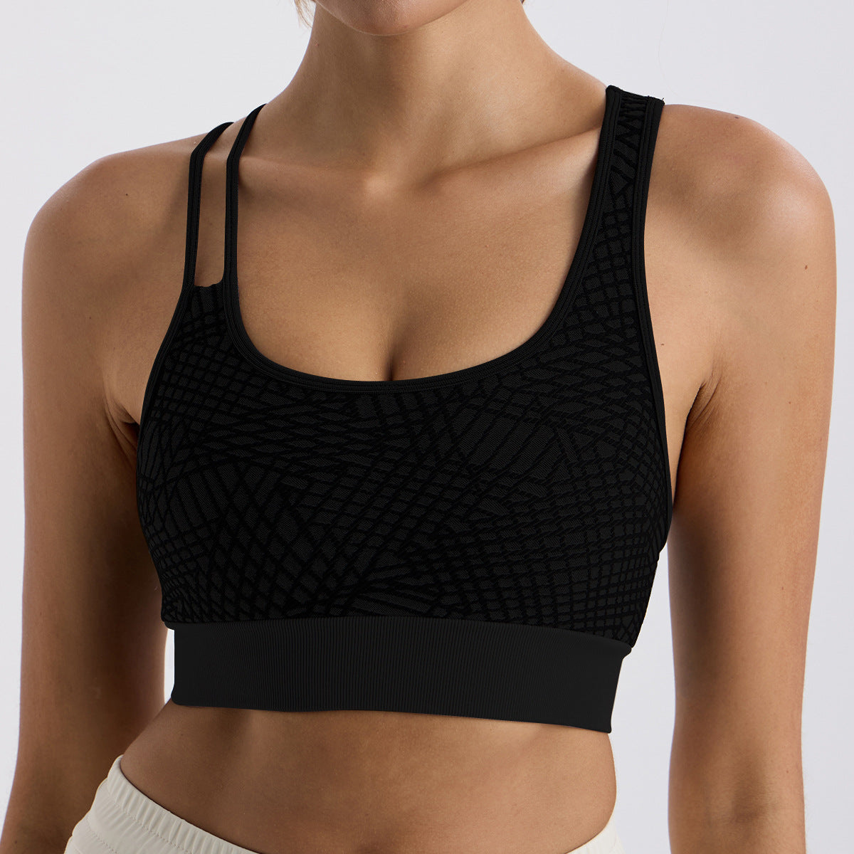 Asymmetrical shoulder strap sports bra